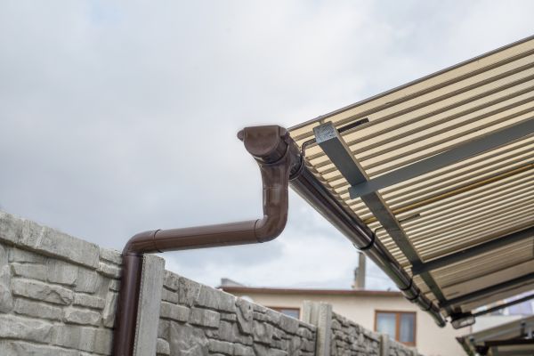 Plastic Downspout Installation in Jackson